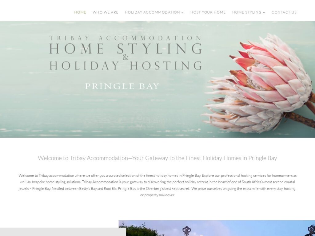 Public TriBay Accommodation homepage showing its protea hero, navigation and holiday hosting introduction